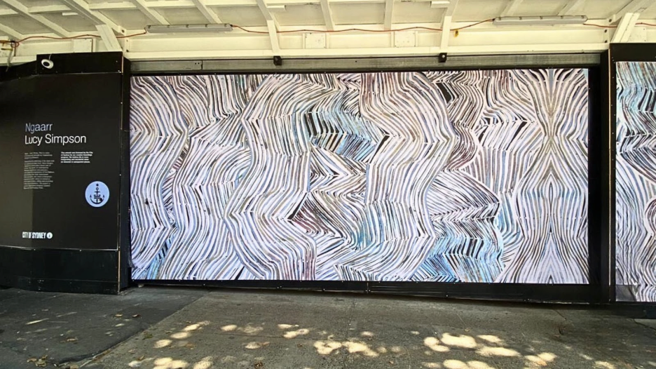 City of Sydney construction hoarding artwork featuring local artists and community stories